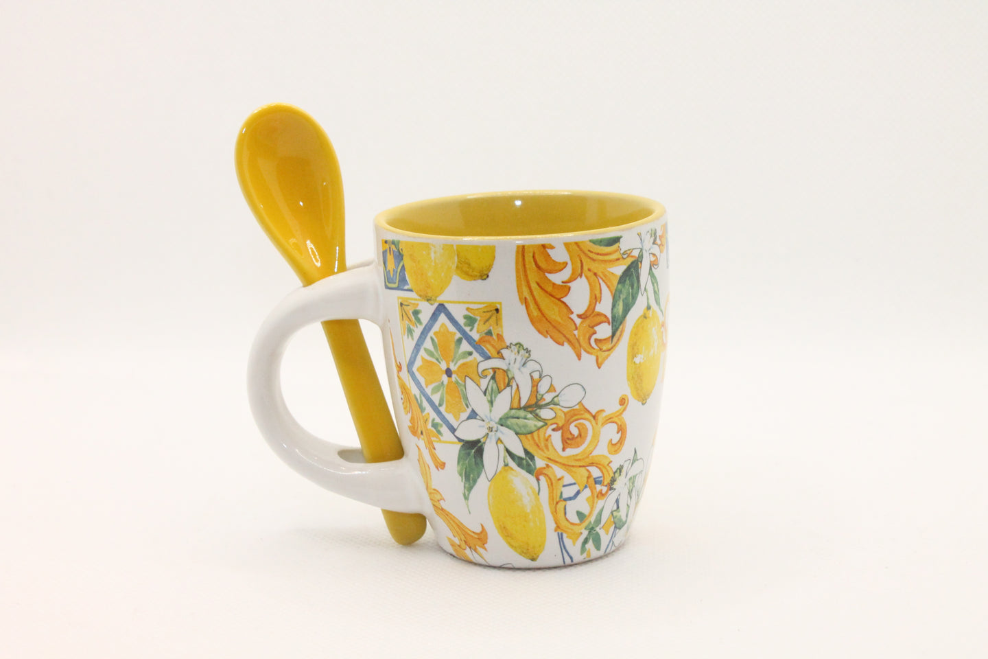 Cup with teaspoon